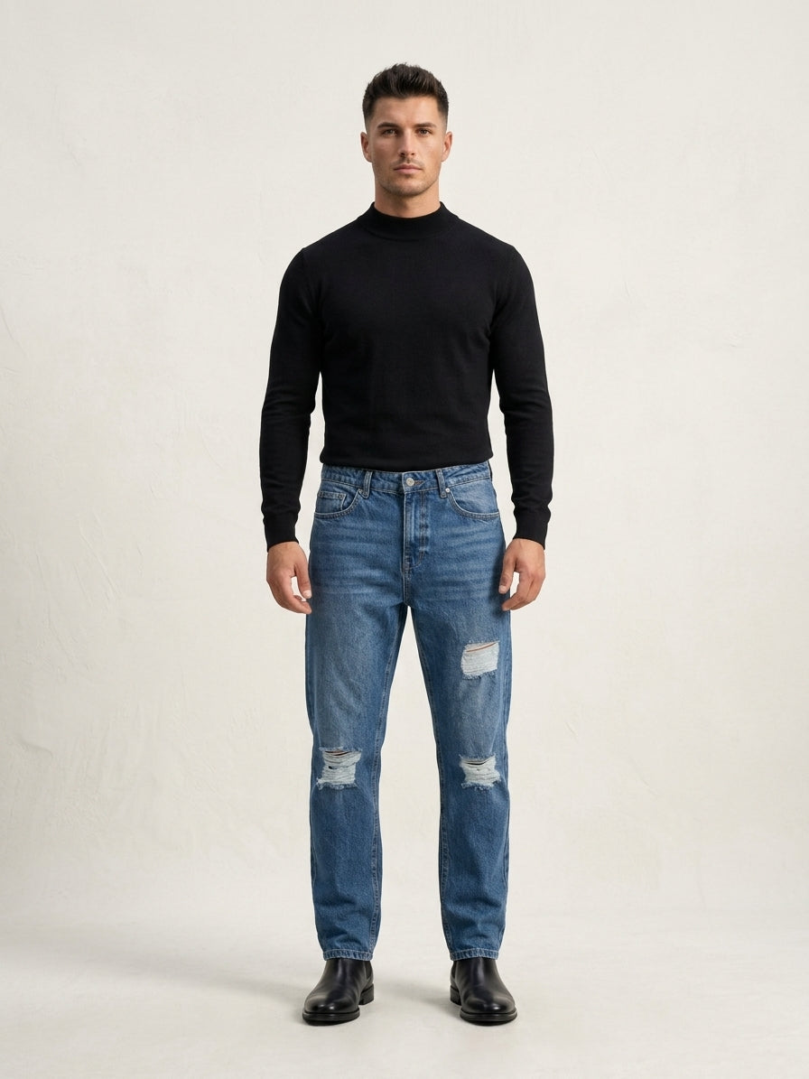 
Luxury Distressed Straight Fit (99 AED)
• The Vibe: High-fashion edge with rugged street elements.
• The Cut: Timeless, structured straight-leg drop that elongates your frame.
• The Fabric: Clean, intentional rectangular ripped details and premium distressing on both thighs and knees.
